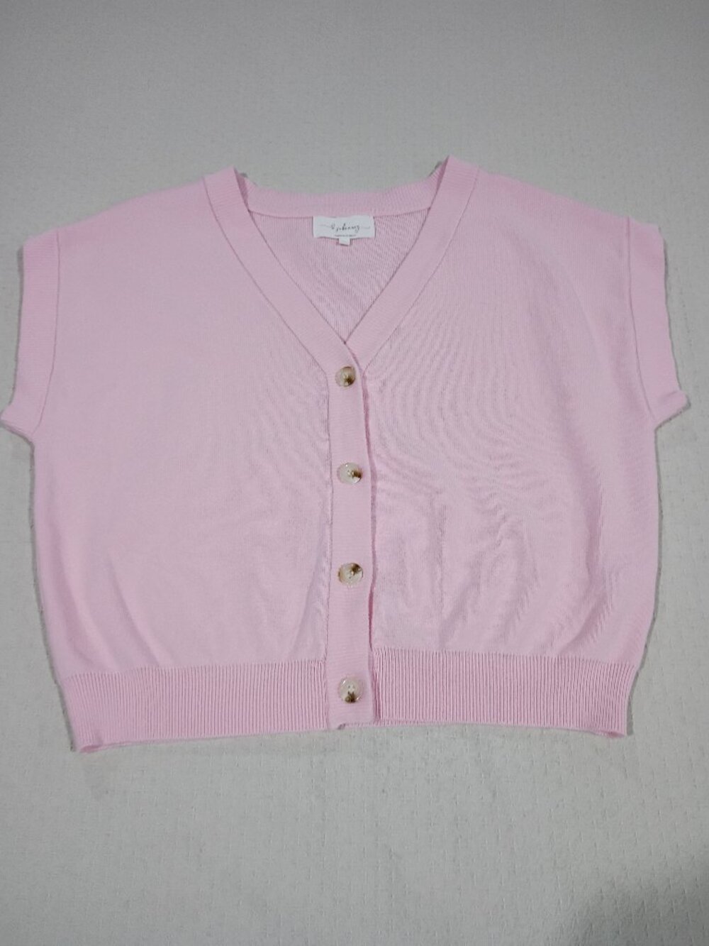 In February soft pink sleeveless cardigan size Small